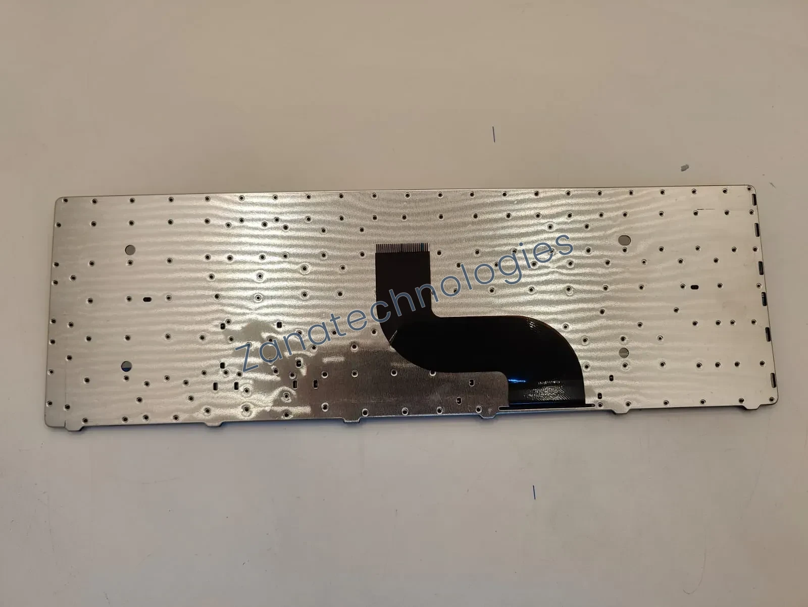 Angled view of the replacement non-backlit keyboard for Acer Aspire E1-521/531/531G/571/571G