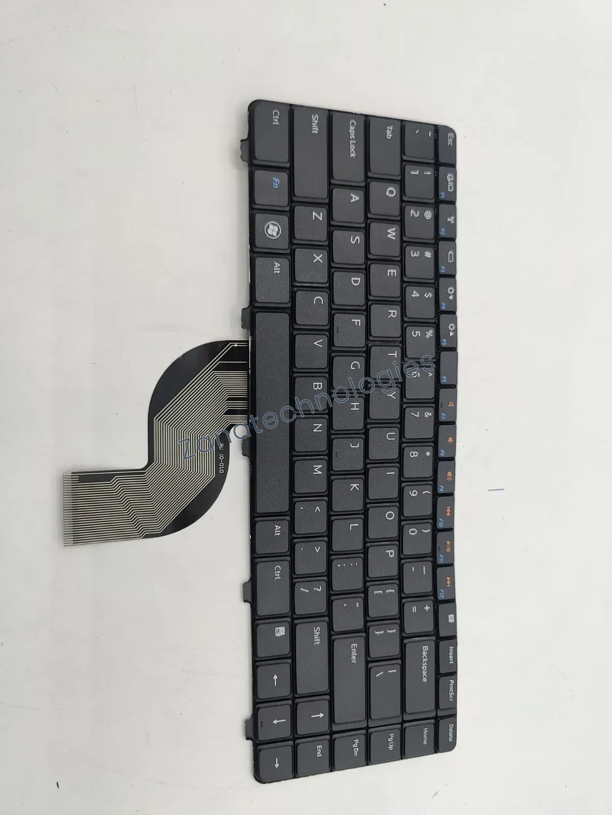 Angled view of the replacement non-backlit keyboard for Dell N4030